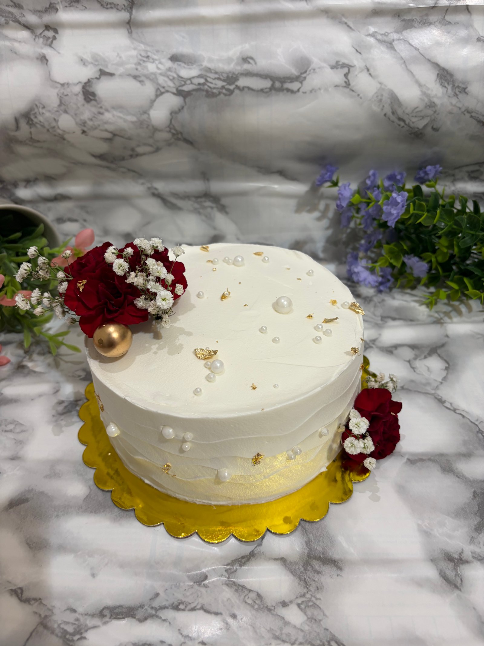 Elegant White and Gold Floral Cake